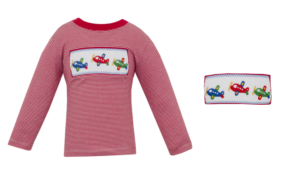 Red striped shirt with airplane design and matching headband on a white background