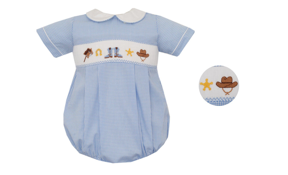 Baby romper with cowboy design on a white background
