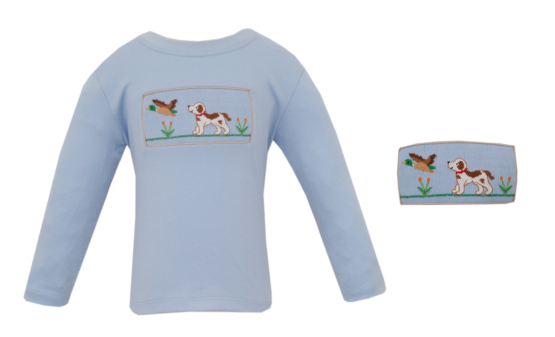 Light blue baby outfit with embroidered design on a white background