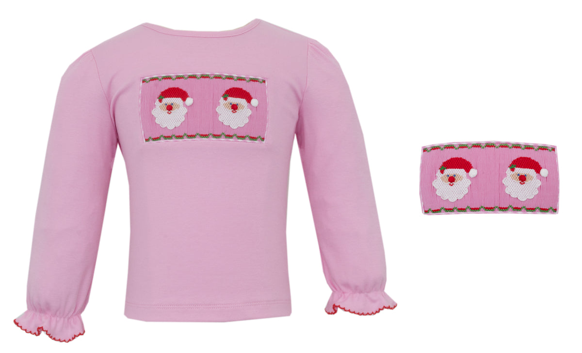 Pink long-sleeve shirt and headband set with Santa Claus design on a white background