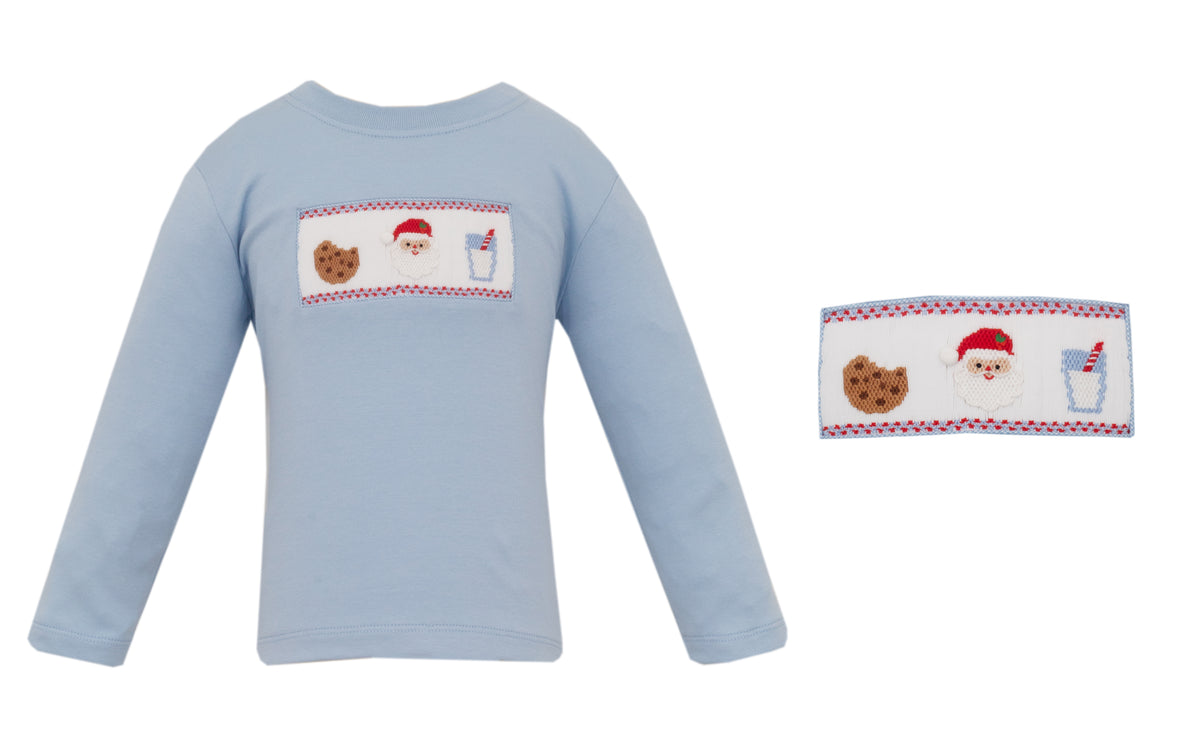 Light blue long-sleeve shirt with festive designs on a white background