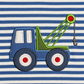 Close-up of the stitched tow truck appliqué with green crane arm, hook and red wheel hubs on blue and white stripes